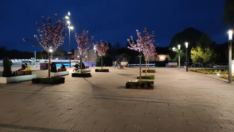 City square at night.